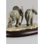 Статуэтка "Слоны, следуя по пути" Lladro